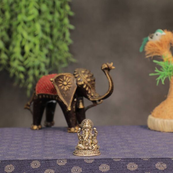 Brass Ganesha, Product Dimention is 1.3 x 1 x 1.8 Inch or 3.3 x 2.54 x 4.57 Cm, Weight is 40 Gram, 1 Pcs